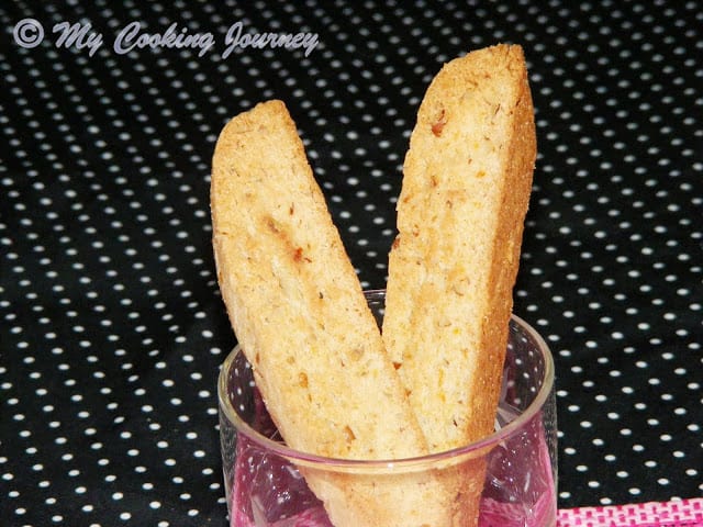  Pair of Walnut Biscotti  in a glass cup