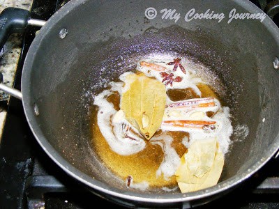 Adding spice in the oil.