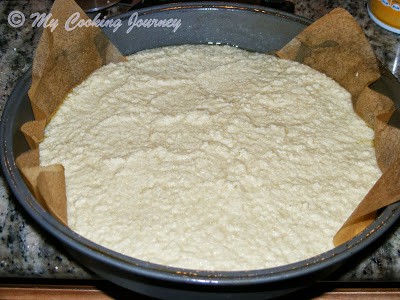 Pouring batter into cake pan