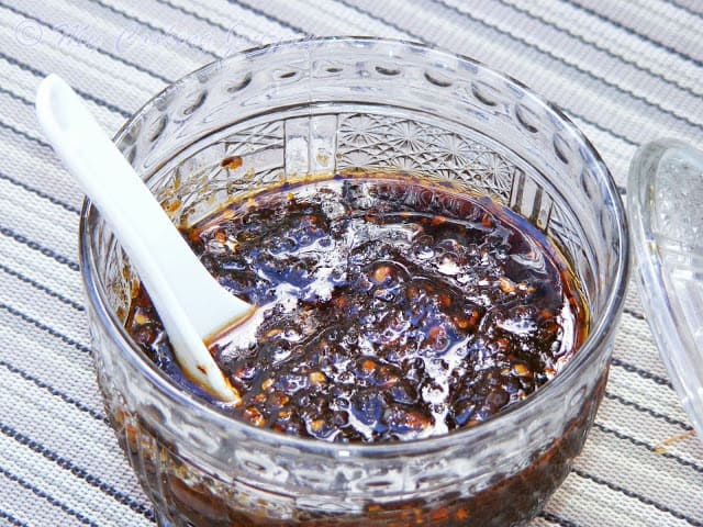 Vegetarian Chili Paste in a container with spoon