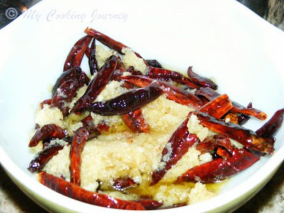 Fried Red chilies, shallot and garlic in a bowl 