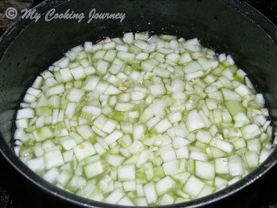 Washing the ingredients in a  bowl for Cucumber Stew