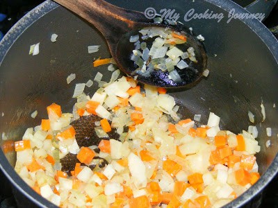 Adding carrot and cooking