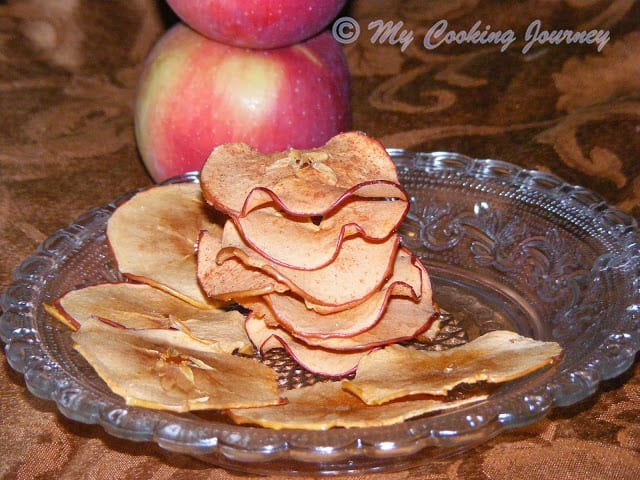 Baked Apple Chips stacked in a plate