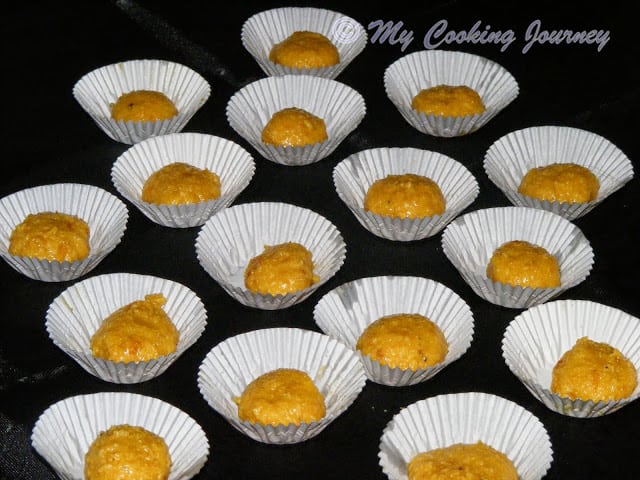 Arranging Milk peda in muffin liners