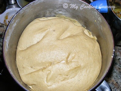 Kneading the dough in a bowl