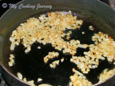 Frying onions in a pan.