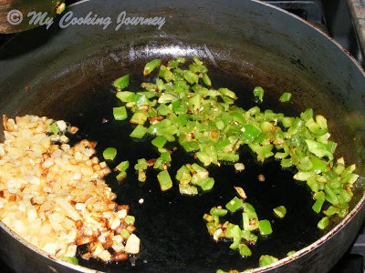 Frying onions and green chillies crushed.
