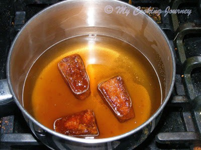 Melting the jaggery pieces