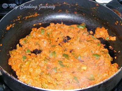 Adding the spices and cooking.