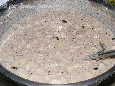making the batter for the ragi dosai