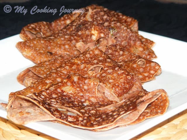 Ragi Dosai  layered and stacked in a plate