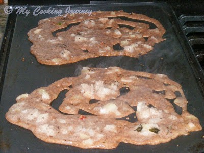 Cooking the Ragi Dosai  in a pan
