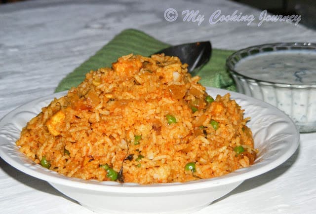 Tamatari Kasoori Pulao in a glass plate