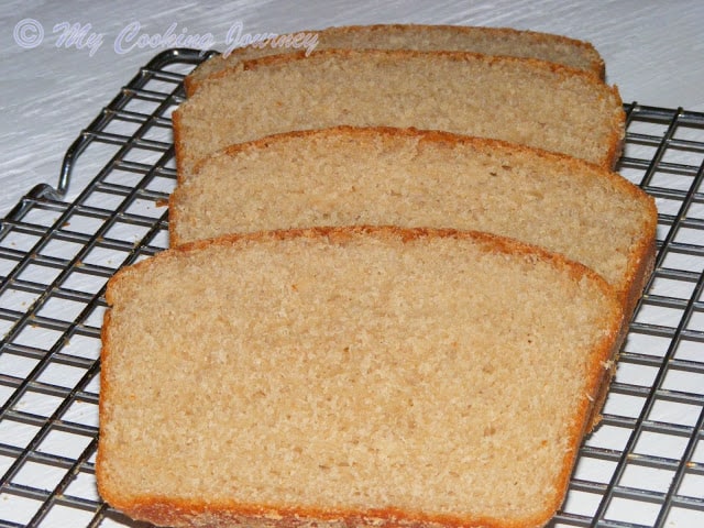 Whole Wheat Sandwich Bread slices on wire rack