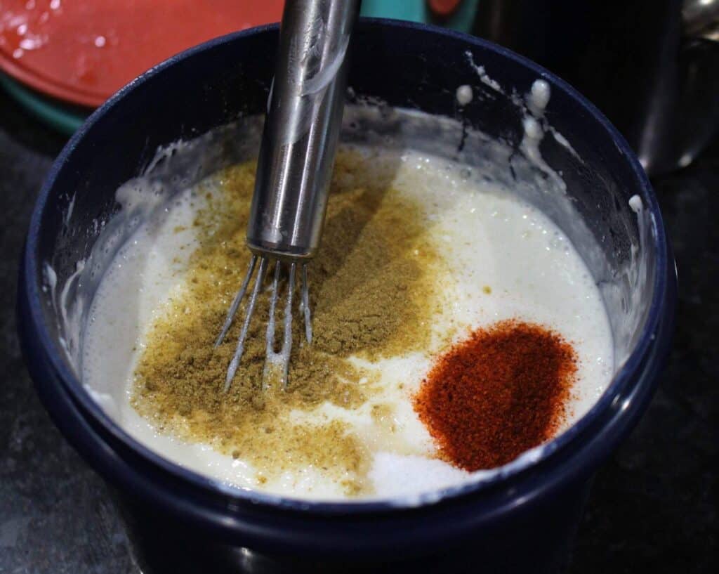Whisked yogurt with spices for raita
