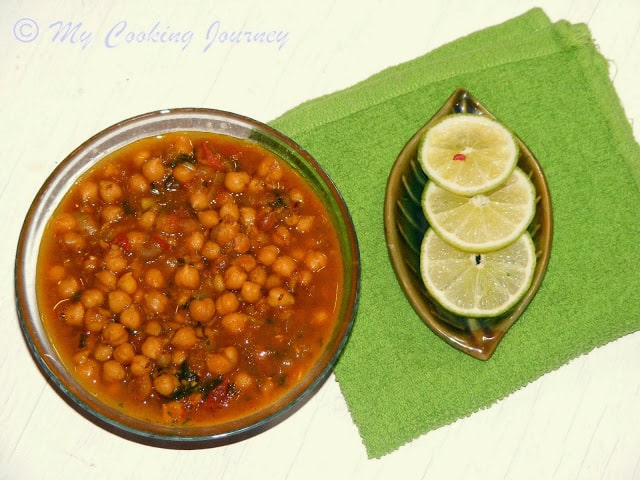 Chole Chaat in a bowl with Lemon.