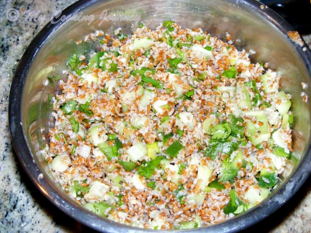 Mixing all the ingredients in a bowl.