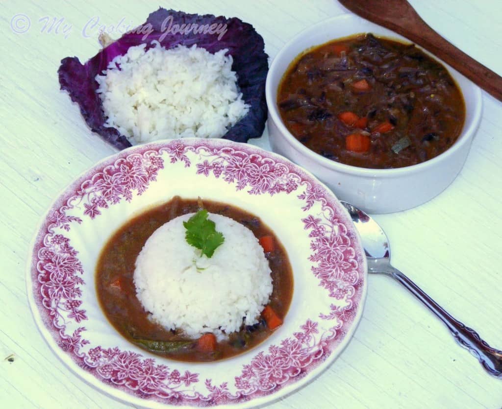 Curried Cabbage in a plate garnish with cilantro