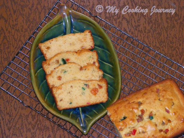 Fruit Cake cut in half and placed in a dish