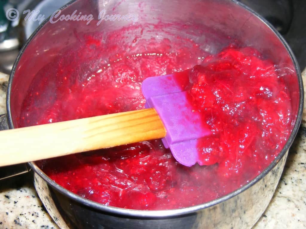 Mashing cranberries