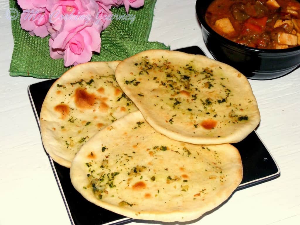 Garlic  naan served with curry