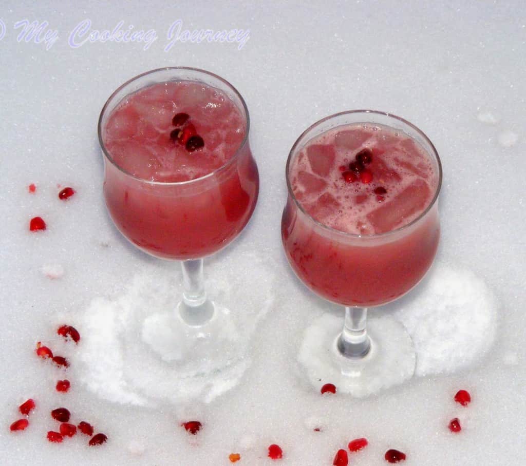 Pomegranate orange juice garnish with Pomegranate 