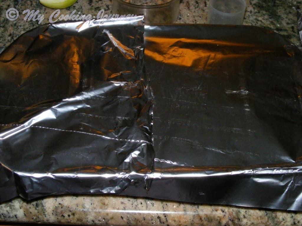 Cover the dish with an aluminum foil