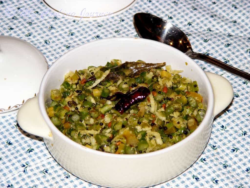 Asparagus curry in a white bowl