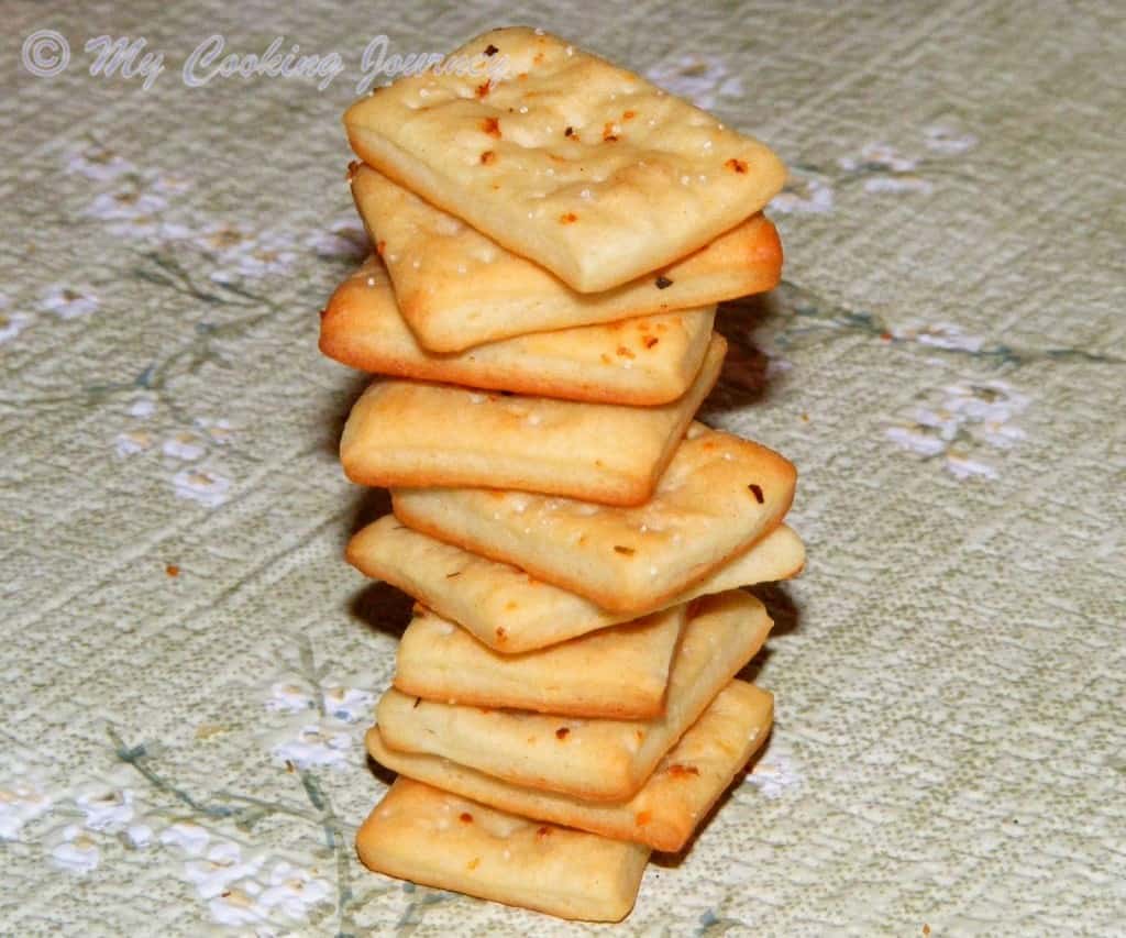 Homemade Soda Crackers pieces stacked as a tower. 