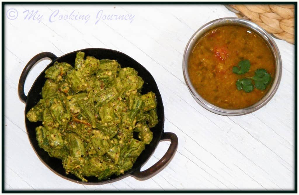 Assam Bhendir Sorsori in a tawa with dal