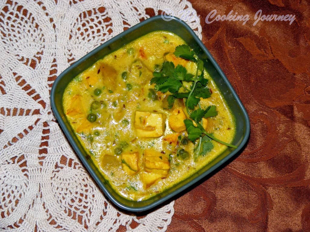 Paneer Curry  in a bowl garnish with Cilantro
