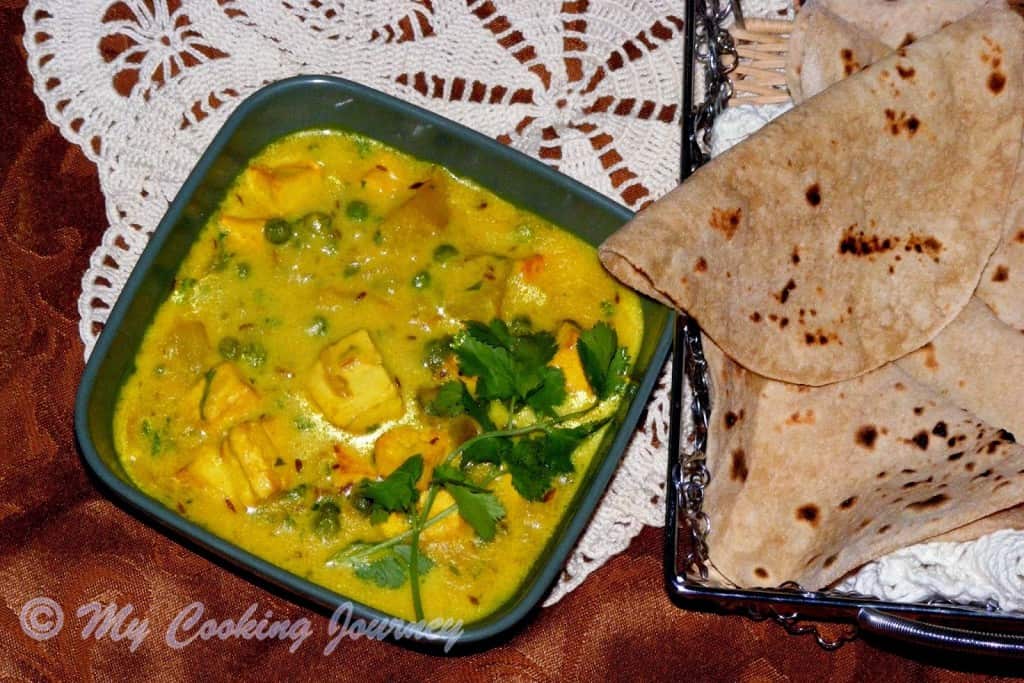 Paneer Curry in a bowl with roti