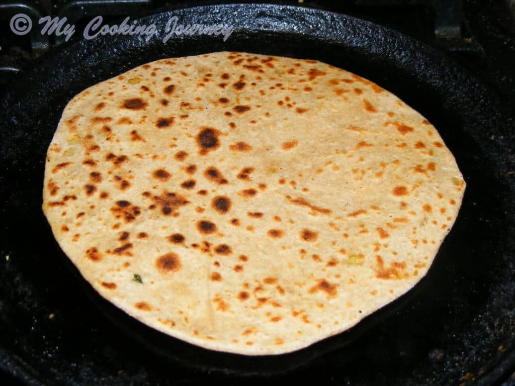 Heat the pan cook the paratha
