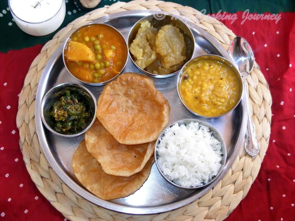 Uttar Pradesh Thaali with poori, rice, dal, subzi and pickle