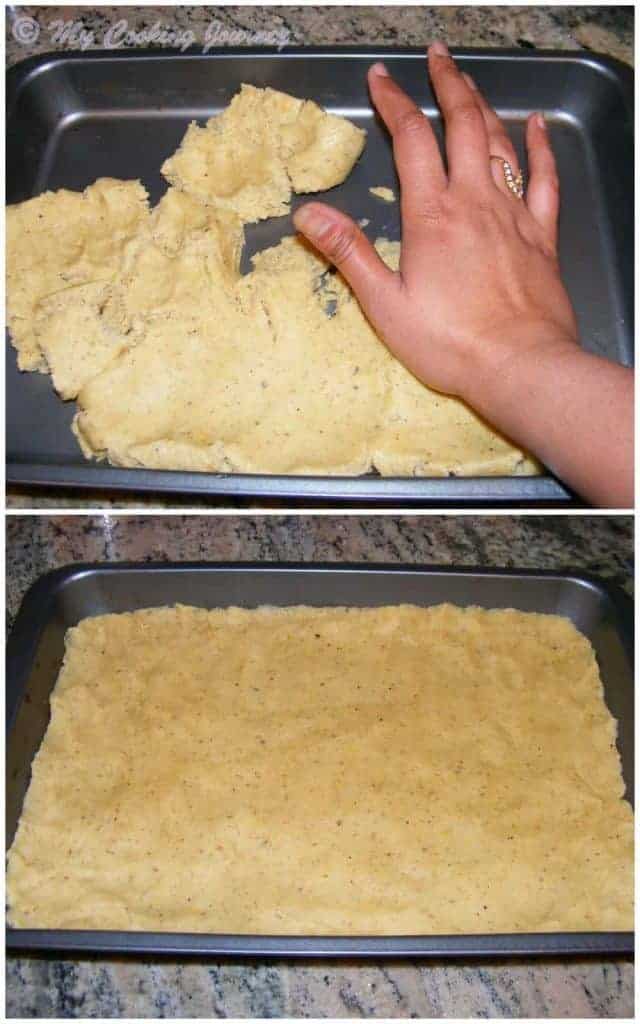 Placing the dough in a pan.