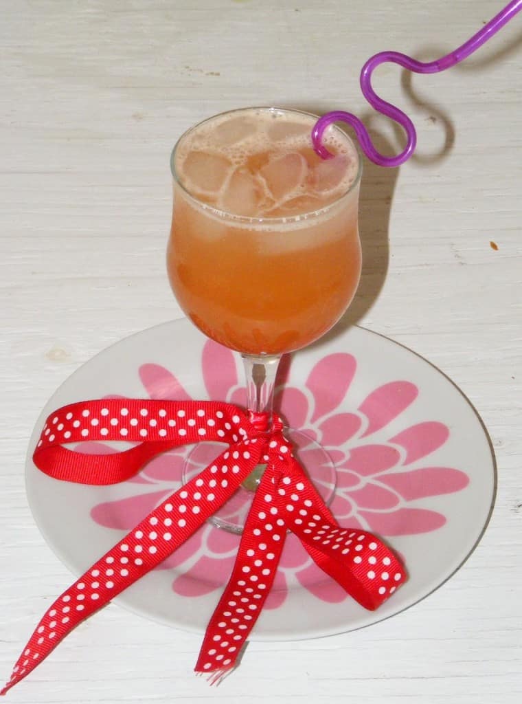 Virgin Madras Cocktail in a glass with Plate