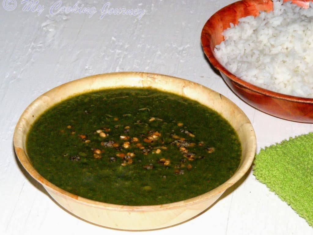 Keerai Milaguttal in a bowl with rice
