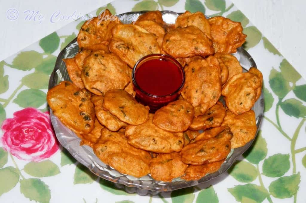 Kenyan Potato Bhajia in a bowl with sauce