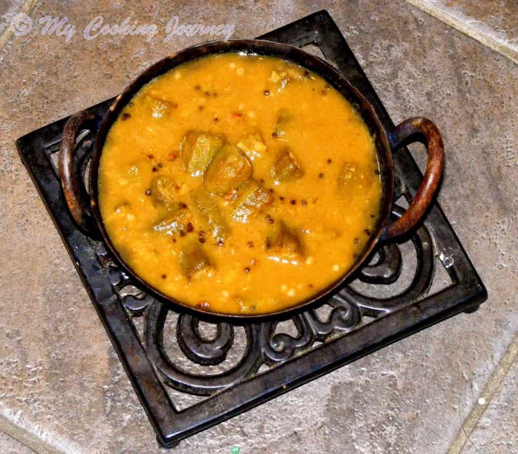 Vendakkai Sambhar served in a pan on a tray