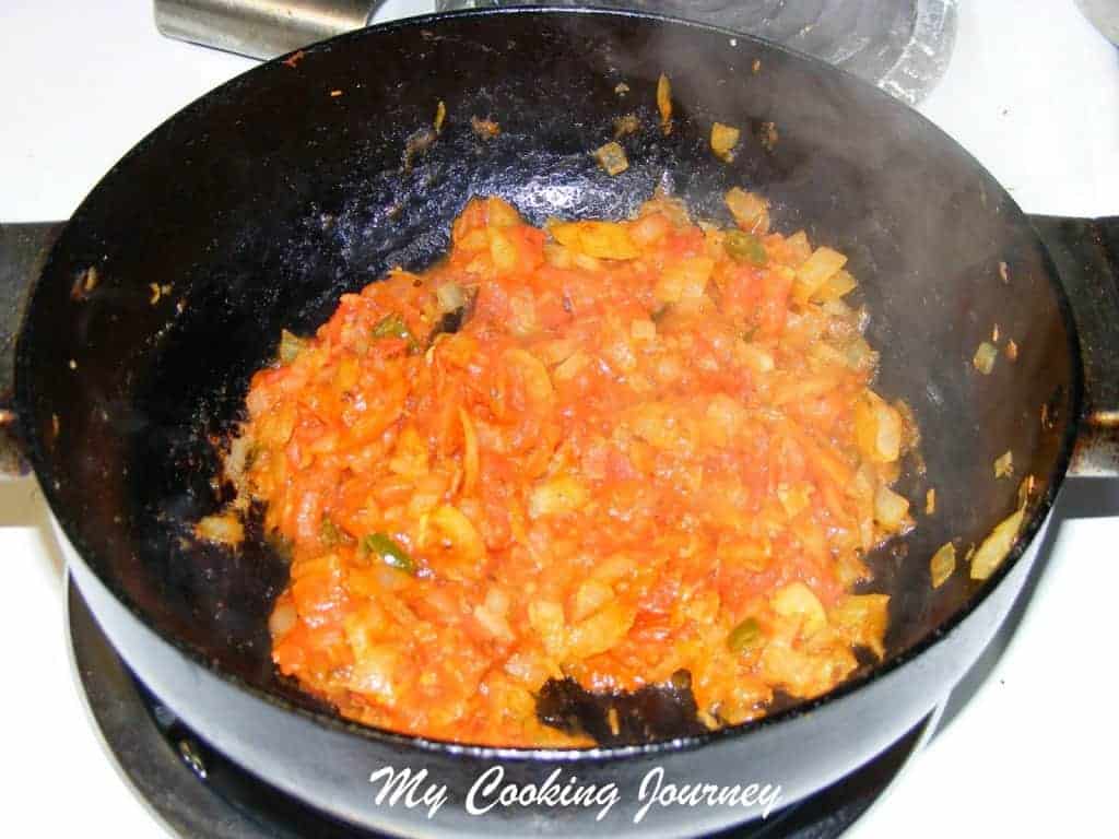 Frying the tomatoes in a pan