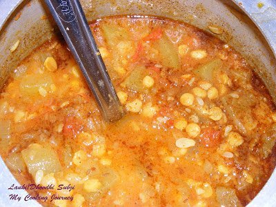 Cooking Lauki Subzi in a cooker