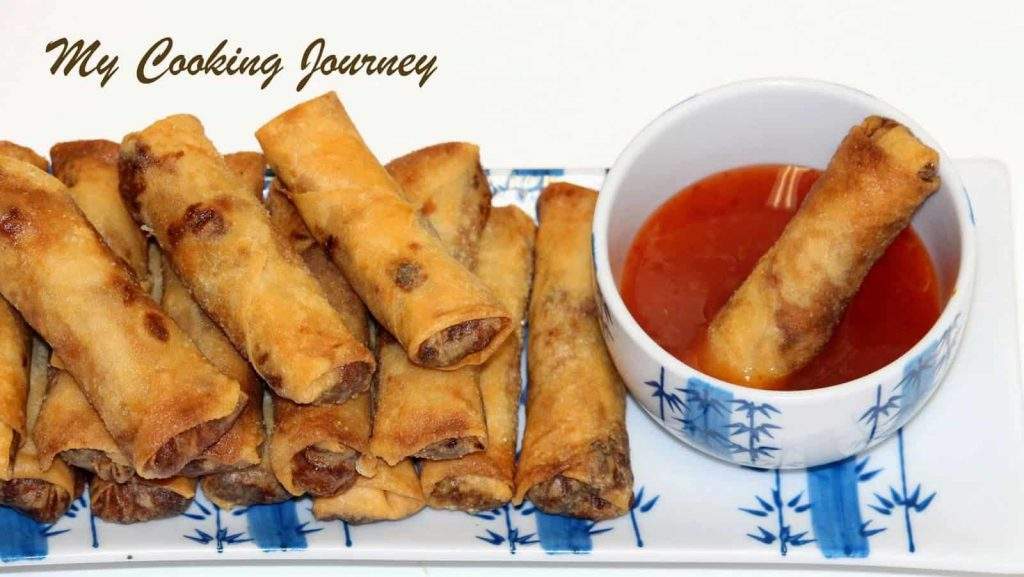 Vegetable and Tofu Spring Rolls with dipping sauce on the side