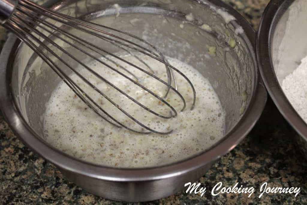 Mixing egg with whisk