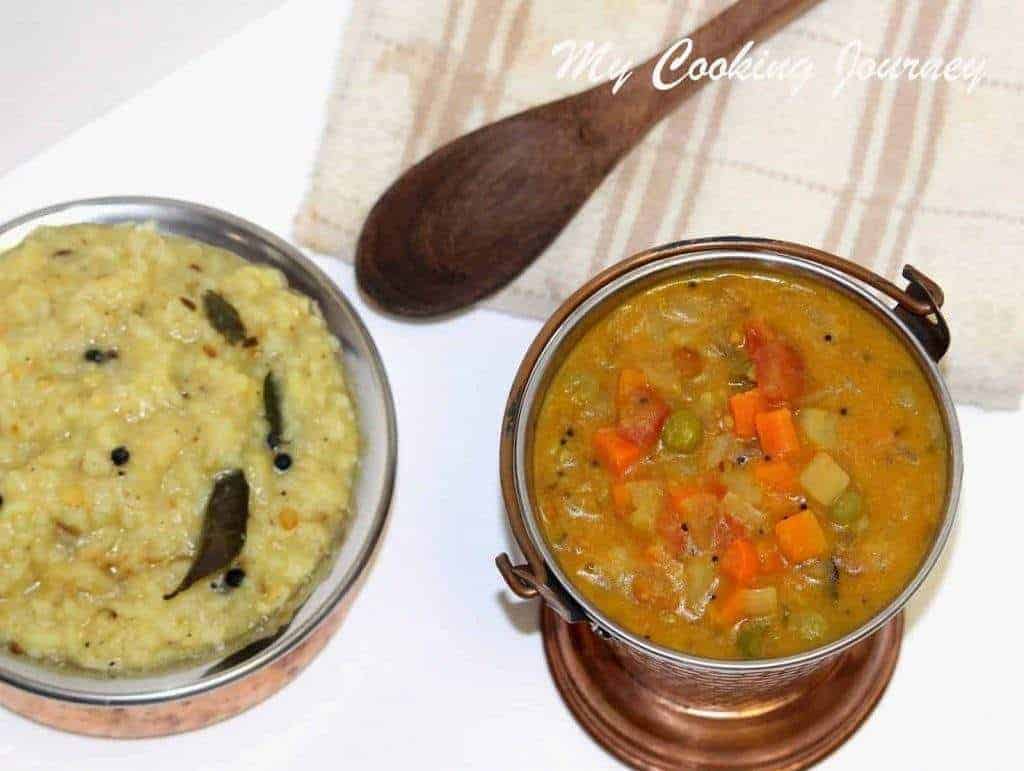 Pongal and Mixed Vegetable Gothsu in a bowl