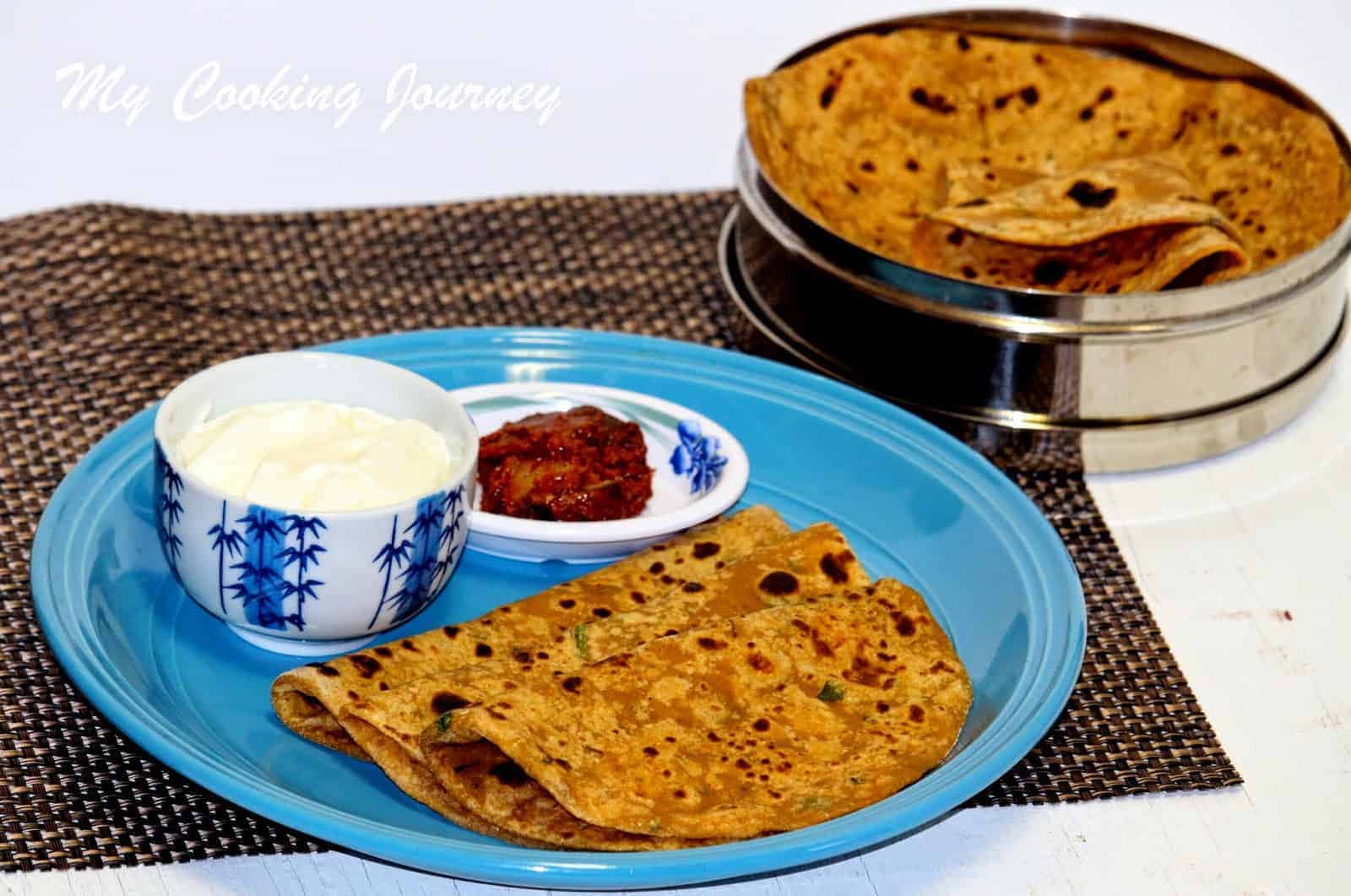 Sweet Potato Paratha served with yogurt and pickle