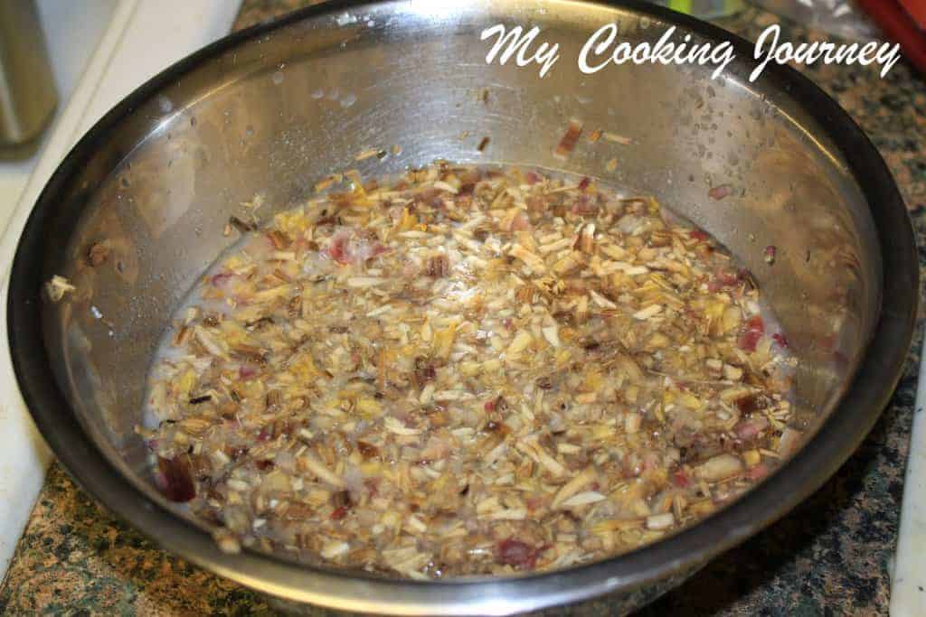 chopped Vazhaipoo soaking buttermilk