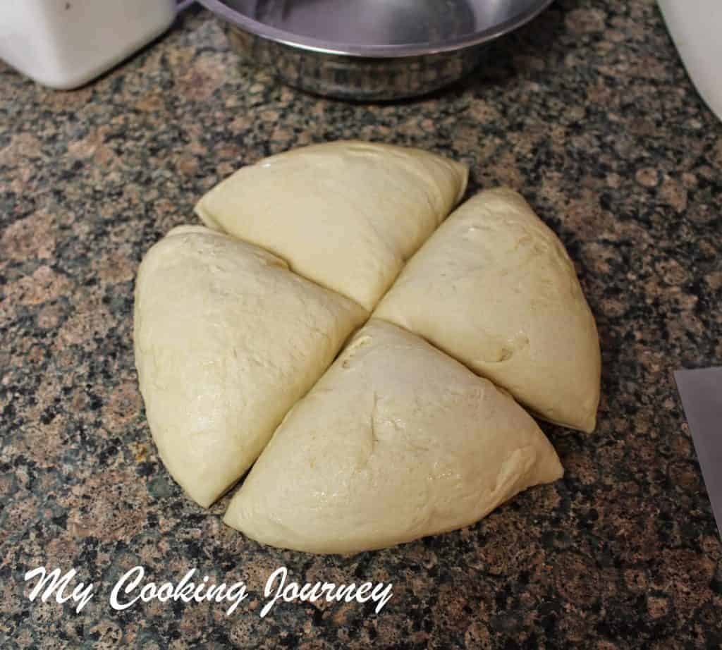 dividing the dough into 4