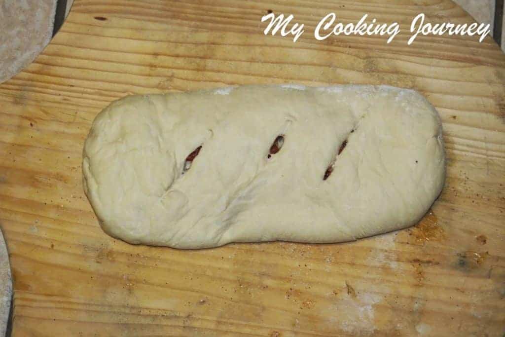 Cut the dough on top 