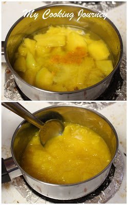 Mangoes cooking in water in a sauce pan